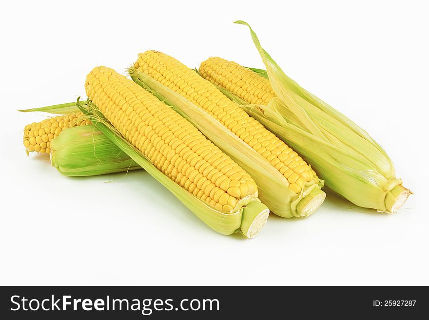 Fresh corn vegetable on a white