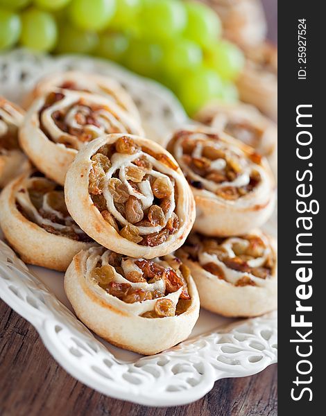 Pastry roll with raisins, selective focus