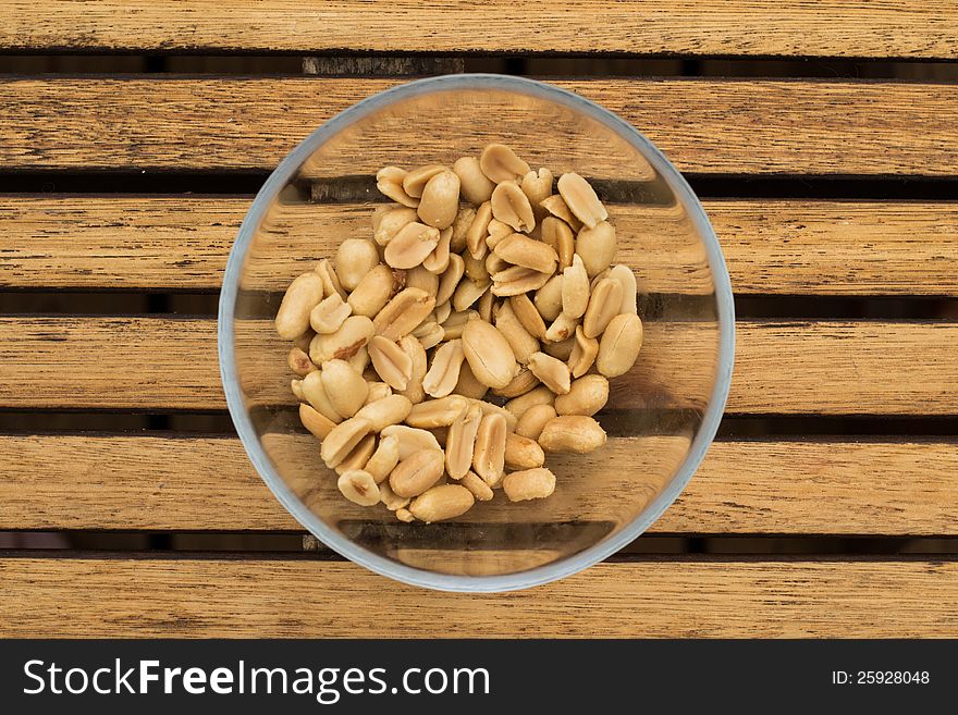 Peanuts in a boul on a table