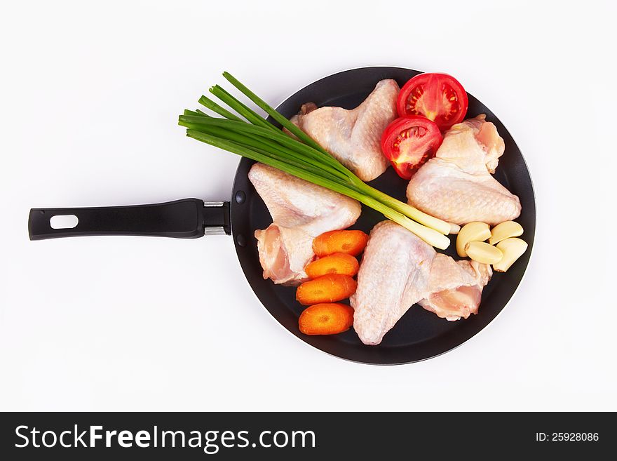 Raw chicken wings with vegetable. Raw chicken wings with vegetable