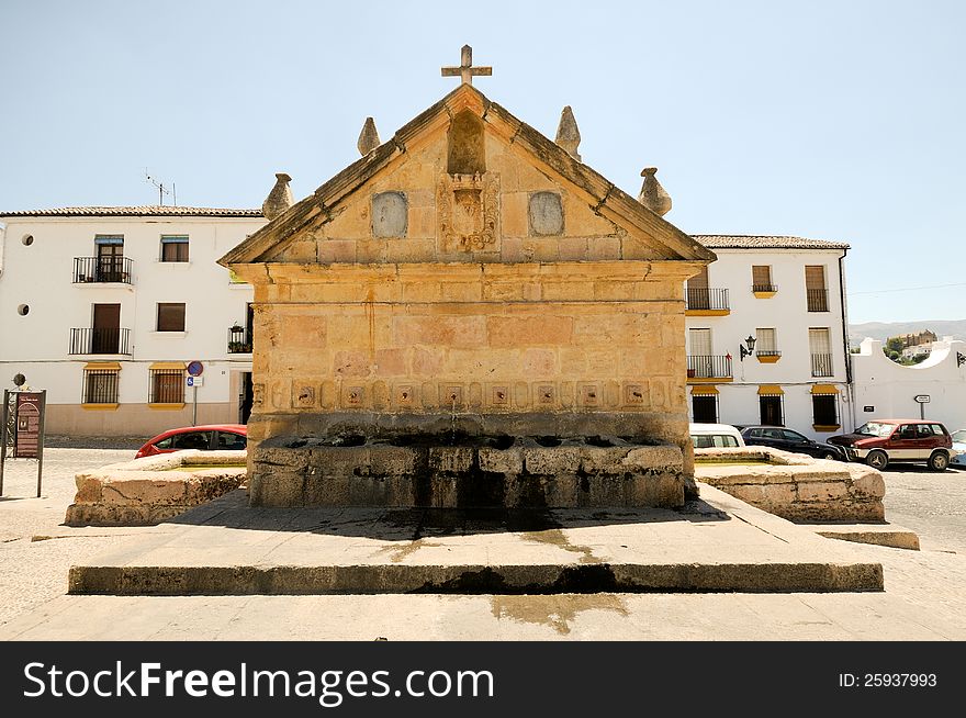 Ocho caÃƒÂ±os fountain in Ronda, one of the famous white villages in MÃƒÂ¡laga, Andalusia, Spain. Ocho caÃƒÂ±os fountain in Ronda, one of the famous white villages in MÃƒÂ¡laga, Andalusia, Spain