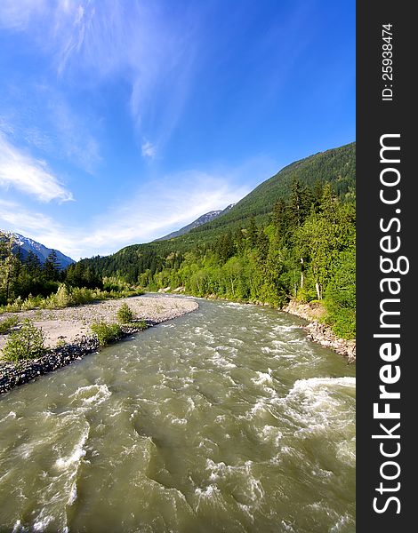 A fast moving river in the Coastal Mountain range of British Columbia Canada. A fast moving river in the Coastal Mountain range of British Columbia Canada