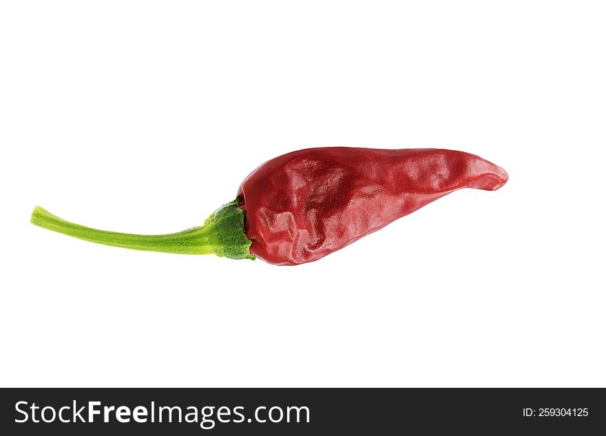 A red chili pepper for consuming as spice
