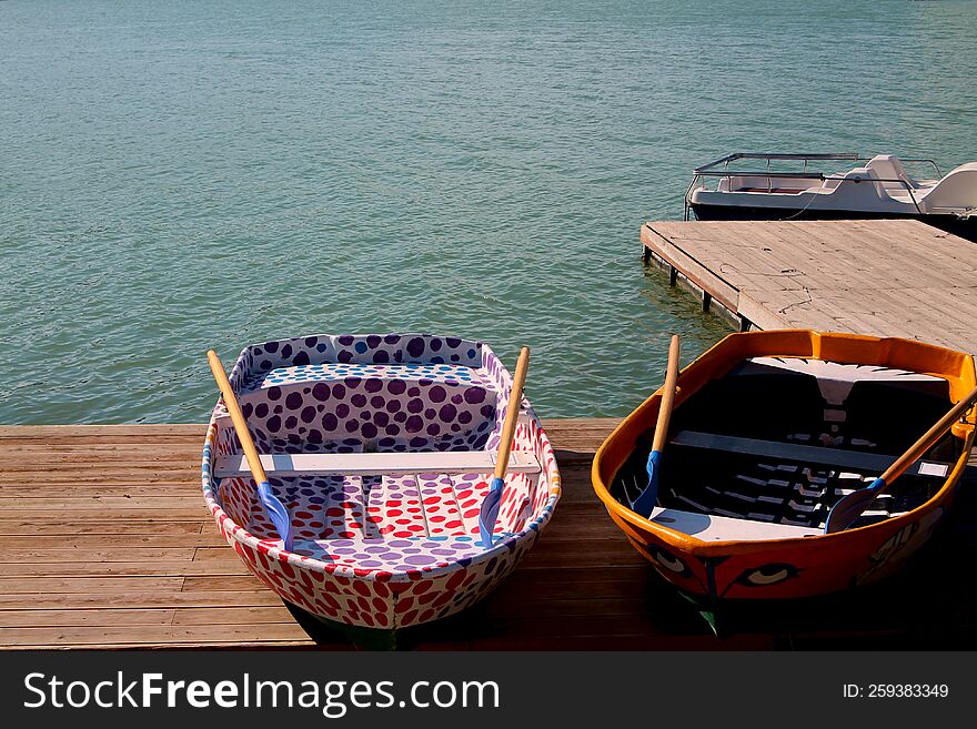 Wooden Boats At The Pier. River Bank In Summer