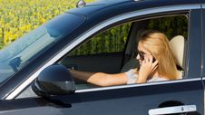 Woman Driver Talking On Her Mobile Royalty Free Stock Photography Woman Driver Talking On Her Mobile Royalty Free Stock Photography
