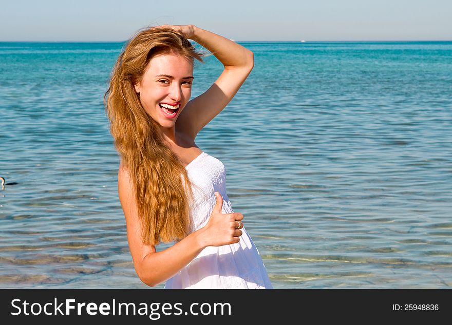 Smiling Woman At The Beach