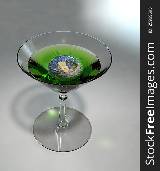 A green drink with the earth floating in it. A green drink with the earth floating in it