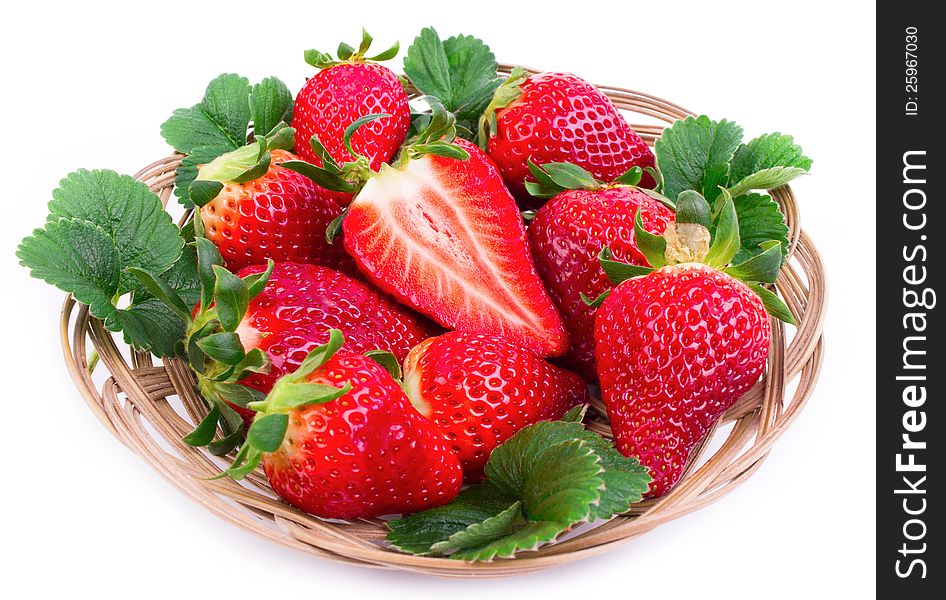 Fresh strawberries in the basket on the white background