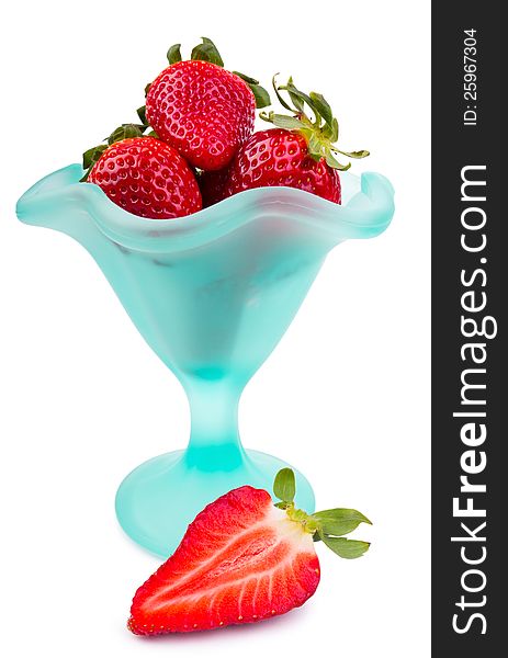 Fresh strawberries in the glass on the white background