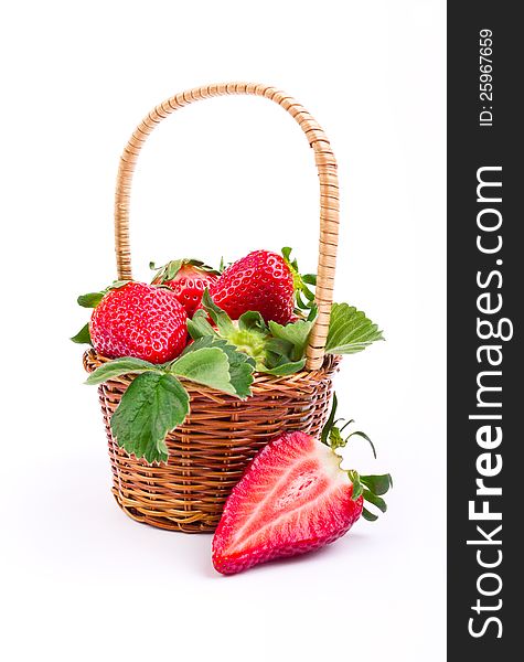 Fresh strawberries in the basket on white background