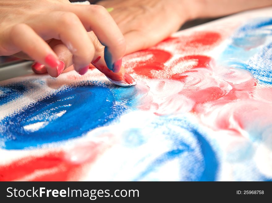 Figure fingers on the canvas. Bright colors. Figure fingers on the canvas. Bright colors.