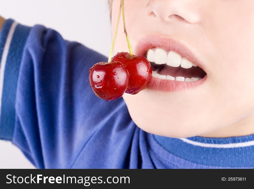 Cherry in the mouth-fresh fruit