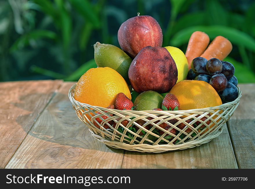 Various natural fruit and vegetables picture taken under warm morning light. Great image to illustrate healthy and natural food for diet or desert or background for fruit and vegetables product. Various natural fruit and vegetables picture taken under warm morning light. Great image to illustrate healthy and natural food for diet or desert or background for fruit and vegetables product.