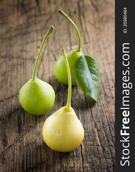 Pears on vintage wooden table