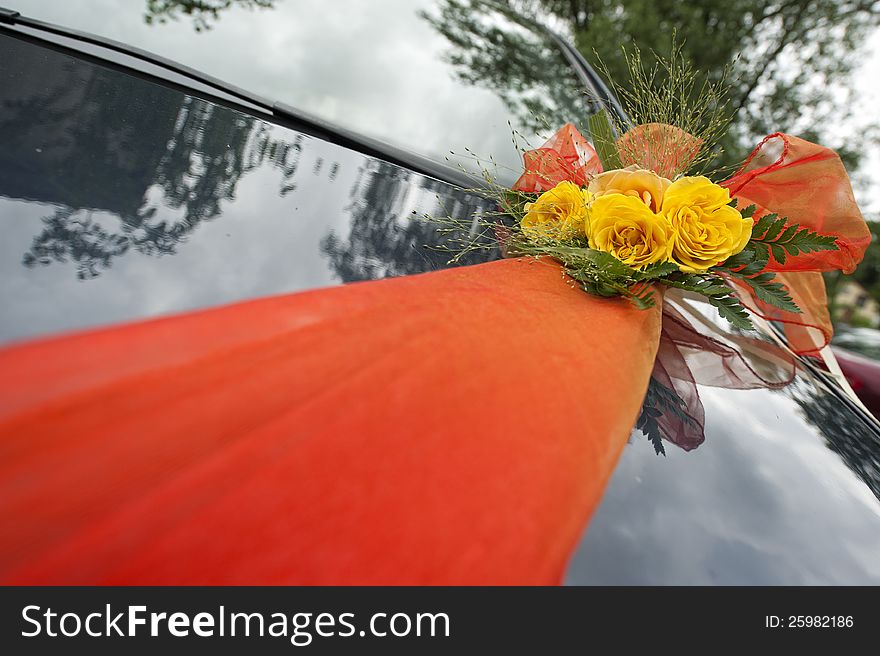 Bridal Bouquet on the Car with ribbon. Bridal Bouquet on the Car with ribbon