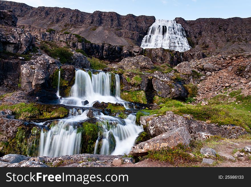 Large waterfall with cascades, long exposure time