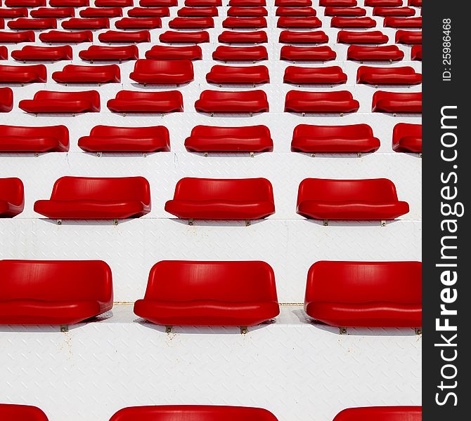 Row of Empty Red Stadium or Arena Seats
