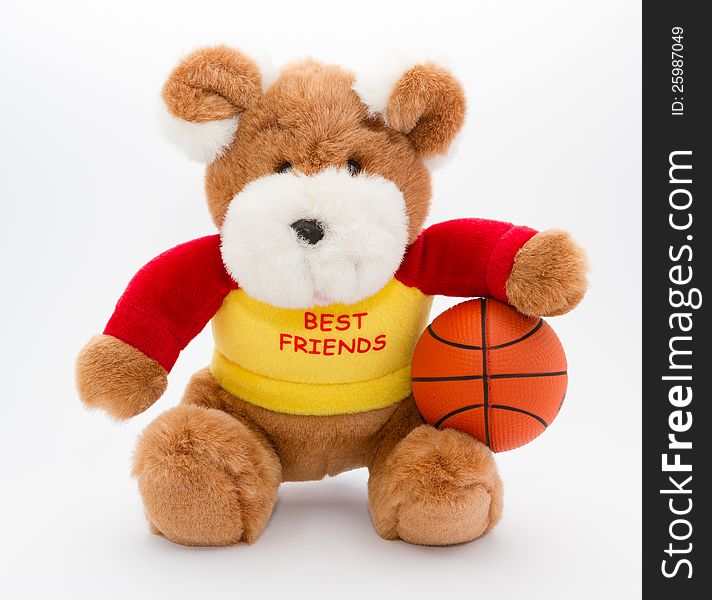 A brown teddy with basketball ball on a white background. A brown teddy with basketball ball on a white background