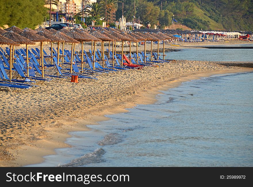 Beach umbrellas on Halkidiki beach in Greece, July, 2012. Beach umbrellas on Halkidiki beach in Greece, July, 2012