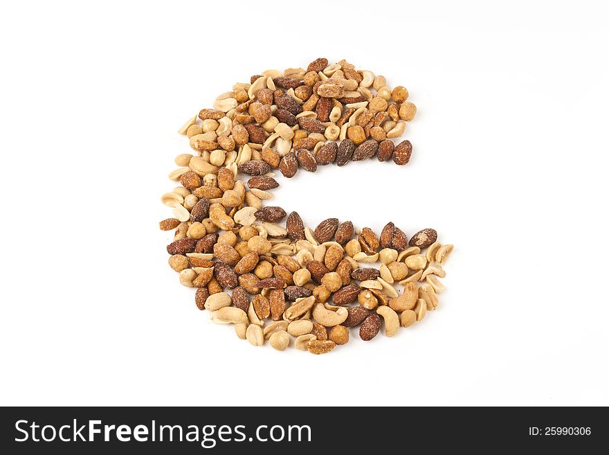 High view of Handful of nuts on white board. High view of Handful of nuts on white board