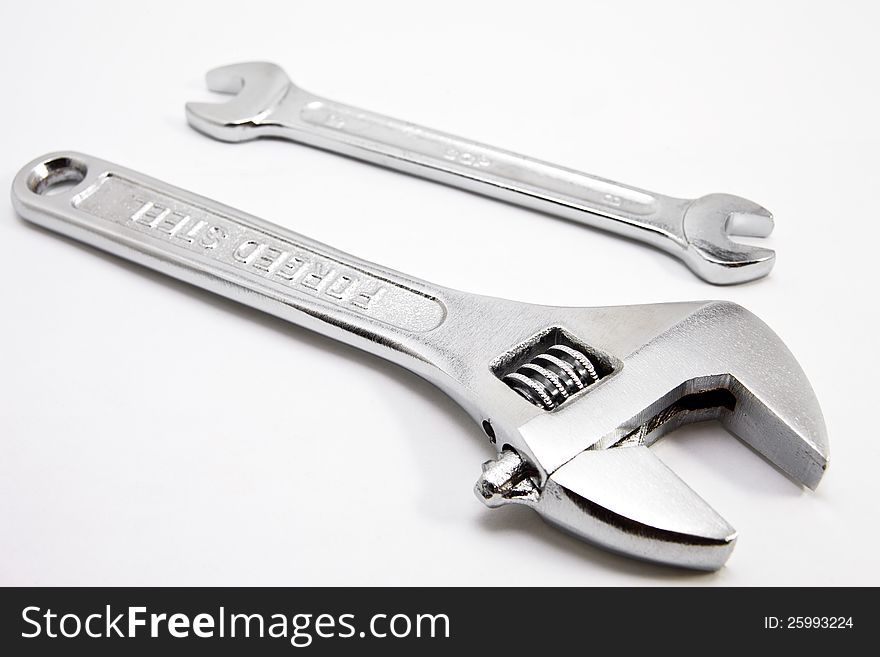 Two wrenches on white background.