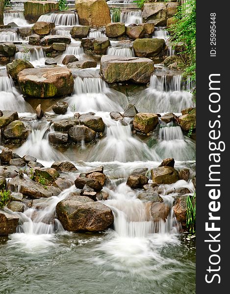 A mountain stream water in the stream never stops flowing. A mountain stream water in the stream never stops flowing.