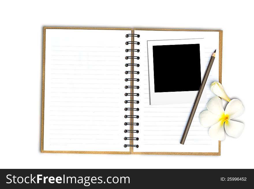 Photo frame on note book with flower