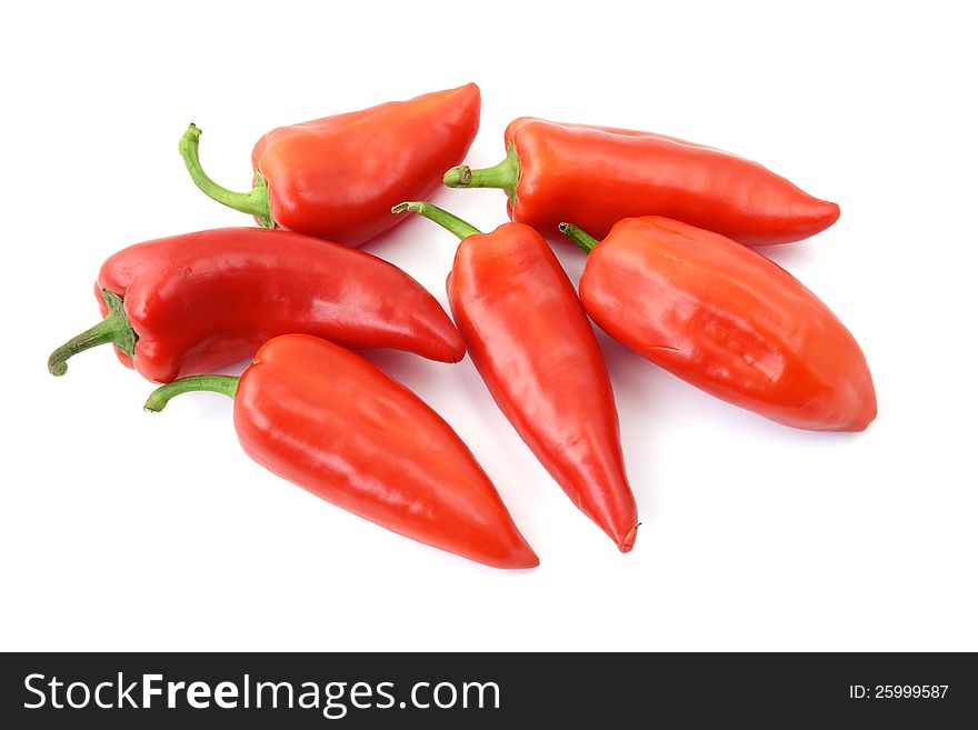 Isolated sweet red paprikas on white background