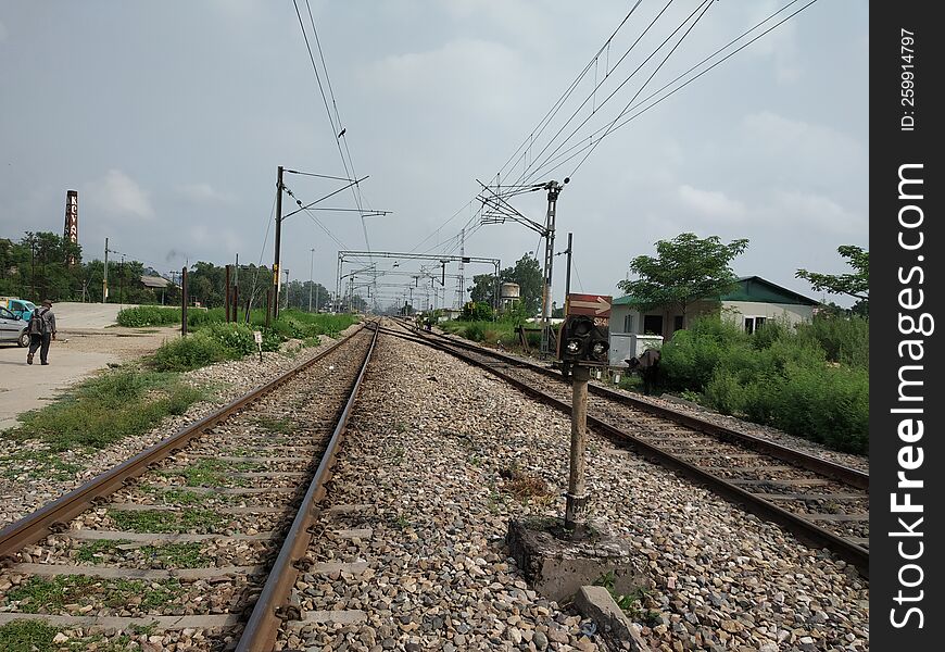 view of a railway track in rural landscape