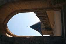 View At A Castle Tower Through An Archway Royalty Free Stock Photo View At A Castle Tower Through An Archway Royalty Free Stock Photo