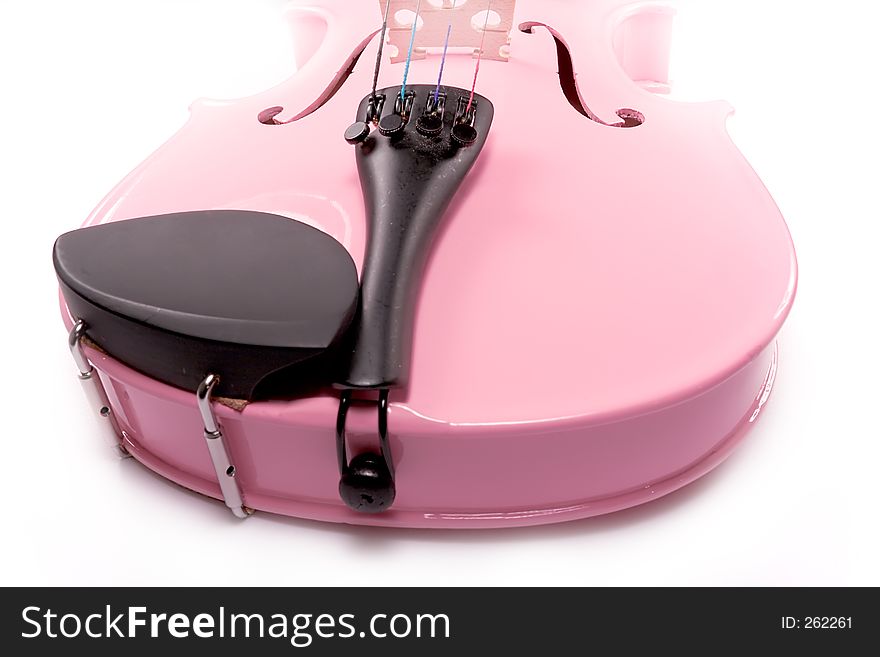 Isolated pink violin set against a white background (over white). Isolated pink violin set against a white background (over white).