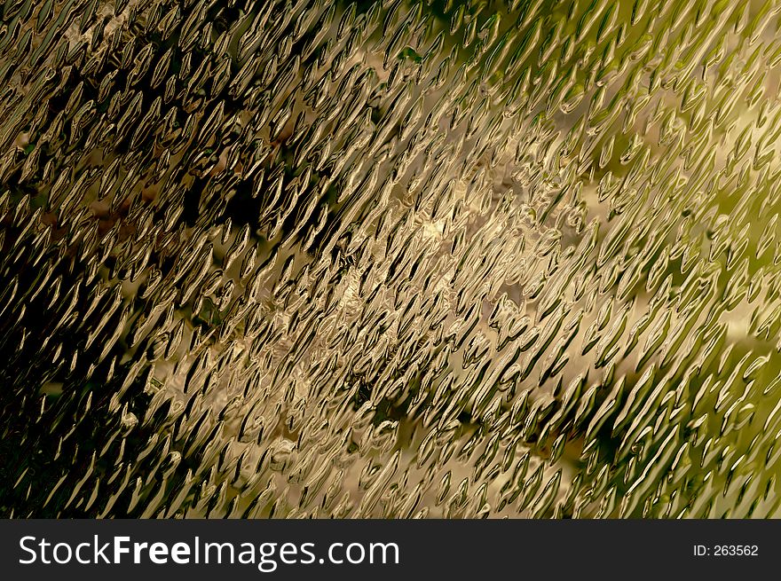 Golden textured glass background. Golden textured glass background