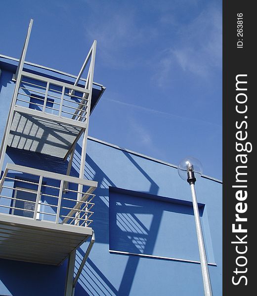 Blue building against the blue sky