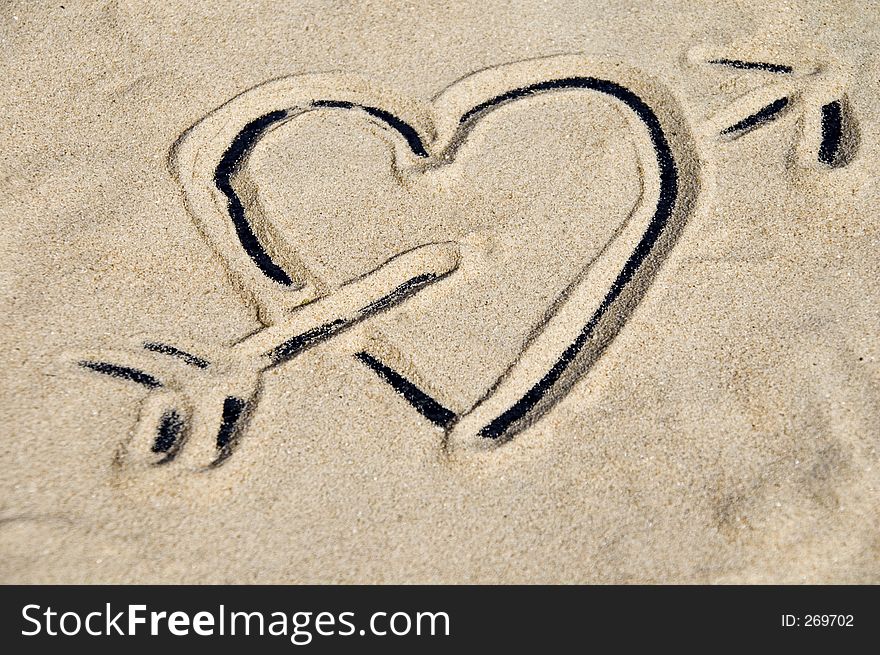 Heart depicted in sand