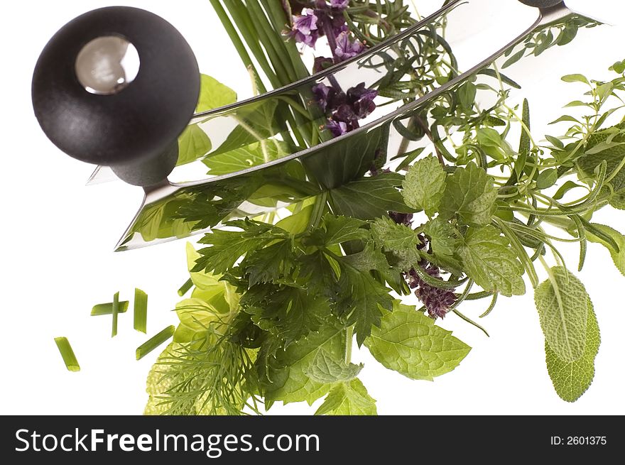 Chopping fresh herbs.