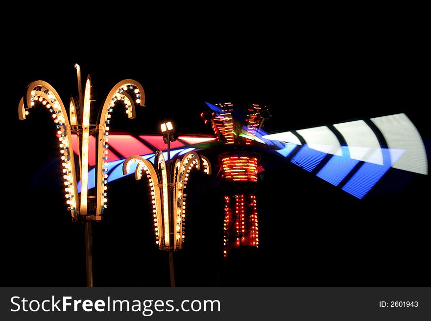 Colorful amusement park lights at night. Colorful amusement park lights at night