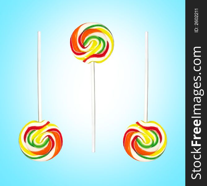 Swirling lollipop on blue background