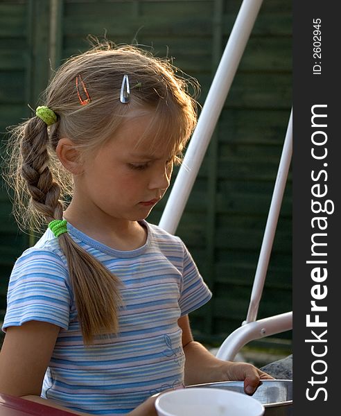 A cute blond hair girl in a garden, standing next to a table, holding some dishes.

<a href='http://www.dreamstime.com/kids-rcollection4583-resi208938' STYLE='font-size:13px; text-decoration: blink; color:#FF0000'><b>MY KIDS COLLECTION Â»</b></a>. A cute blond hair girl in a garden, standing next to a table, holding some dishes.

<a href='http://www.dreamstime.com/kids-rcollection4583-resi208938' STYLE='font-size:13px; text-decoration: blink; color:#FF0000'><b>MY KIDS COLLECTION Â»</b></a>