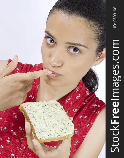 Girl Eating Slice Of Bread