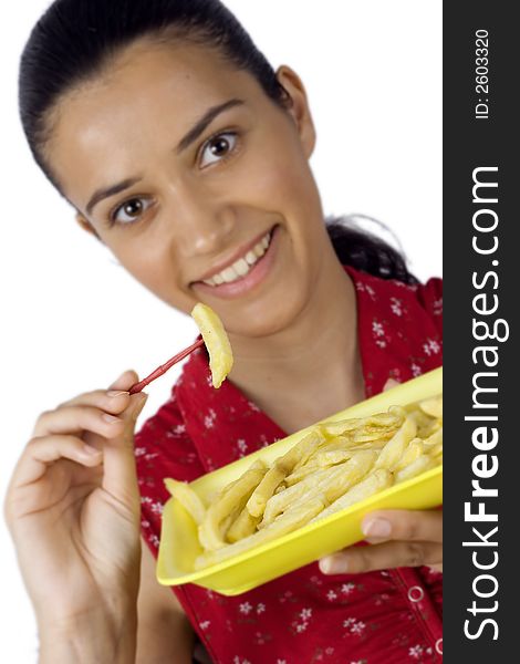 Smiling girl holding plate with potatoes and eating. Smiling girl holding plate with potatoes and eating