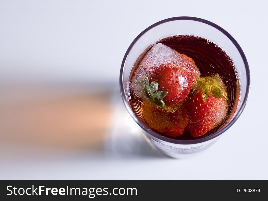 Strawberry drink with ice cubes. Strawberry drink with ice cubes