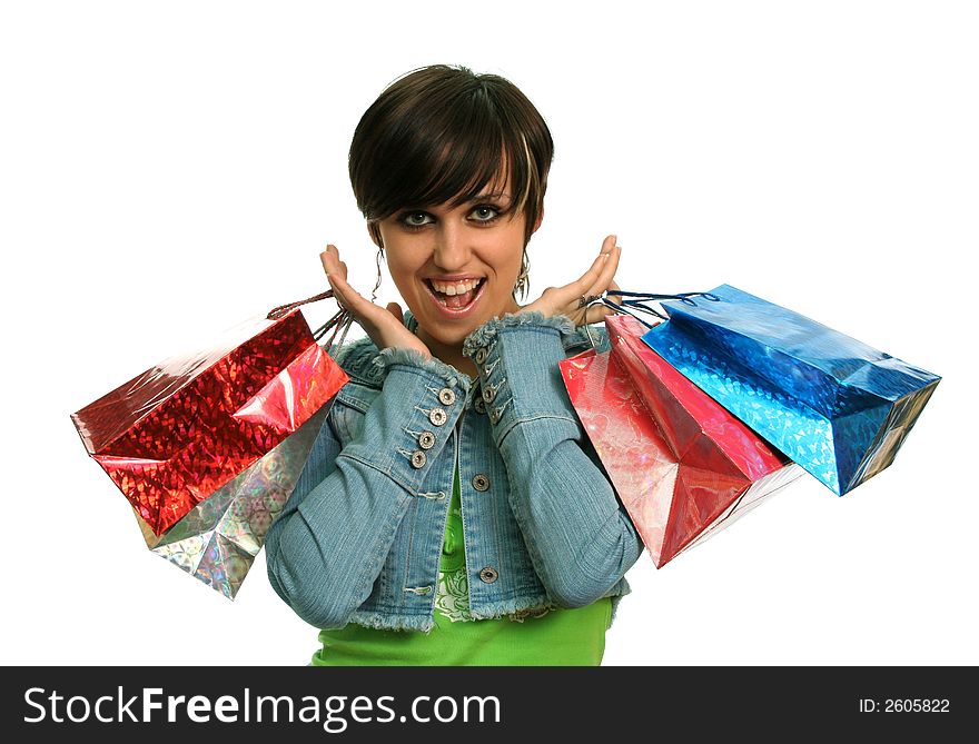 The happy girl with purchases, on a white background