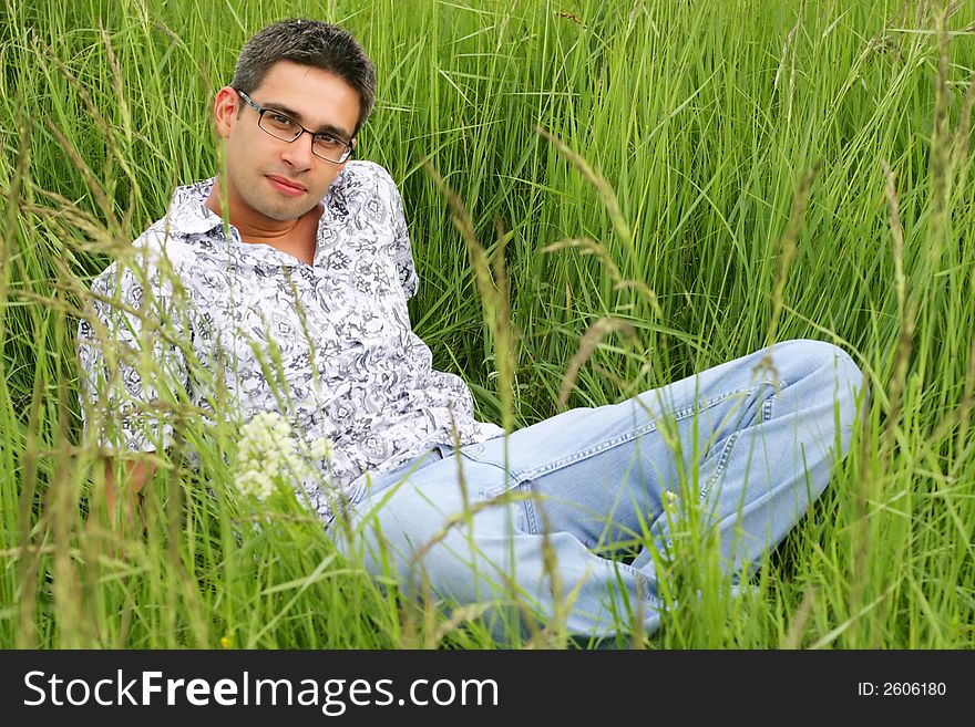 Young man in the grass