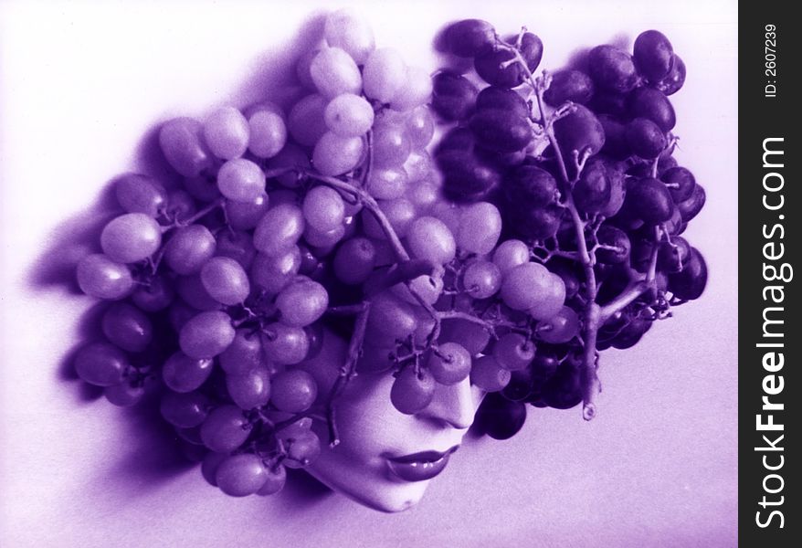 Still-life Of Mask & Grapes