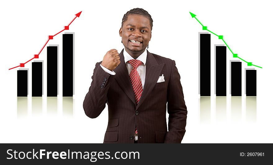 This is an image of a businessman excited due to a double rise in profits, represented by the graphs behind him. This is an image of a businessman excited due to a double rise in profits, represented by the graphs behind him.