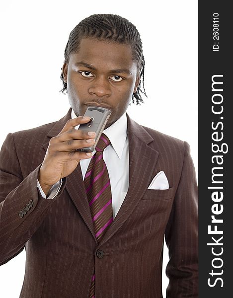 This is an image of a businessman pondering/focussing while holding a personal digital assistant/mobile phone. This image can be used to represent planning themes. This is an image of a businessman pondering/focussing while holding a personal digital assistant/mobile phone. This image can be used to represent planning themes.