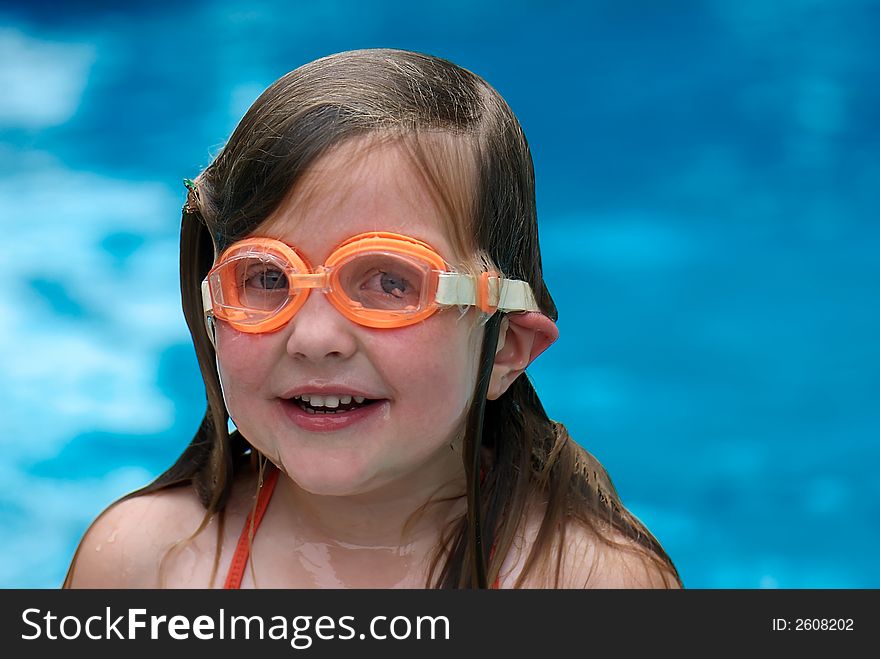 Girl swimming with goggles