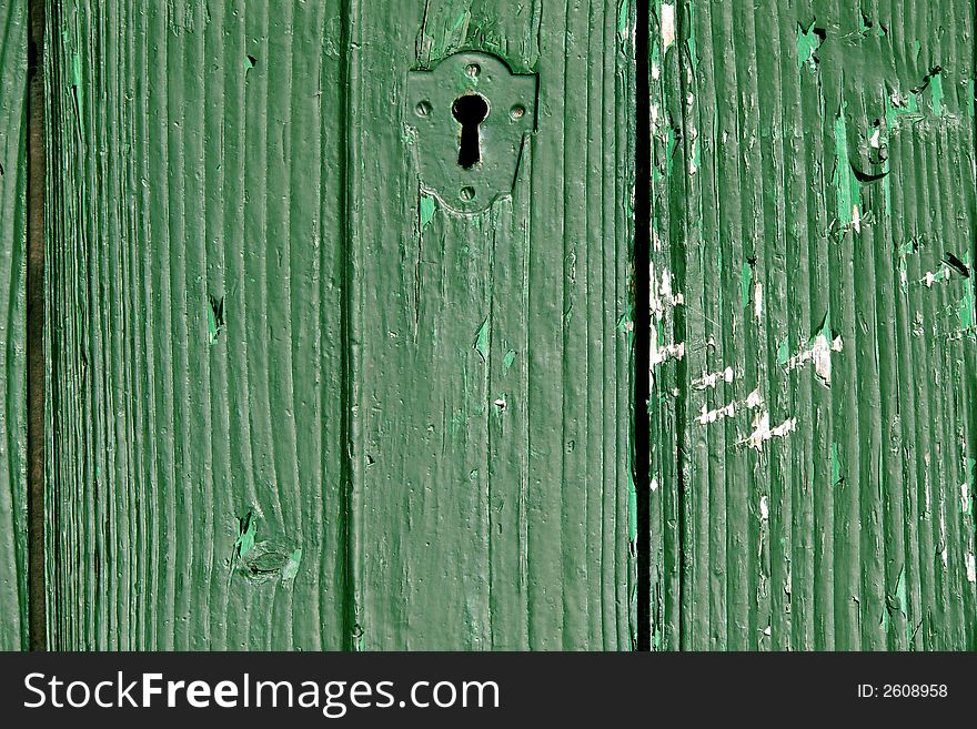 Detail of an old green door