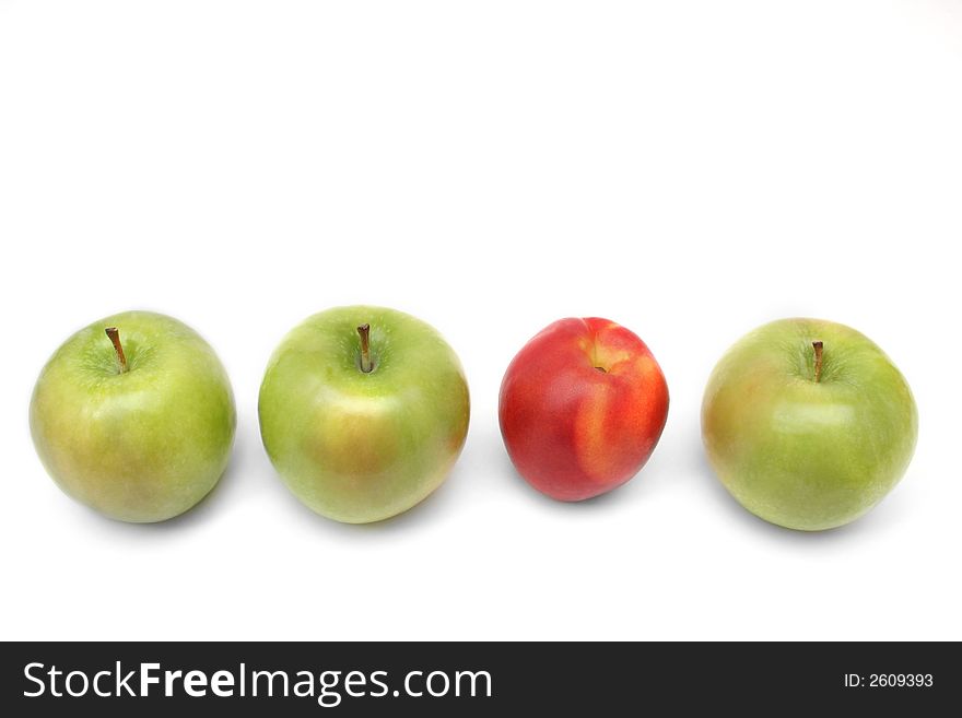 Four green apples and one peach. Four green apples and one peach