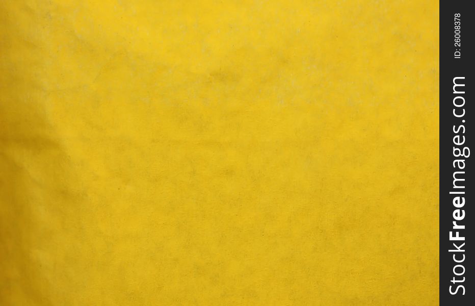 Piece of wrapping paper of yellow color. Piece of wrapping paper of yellow color